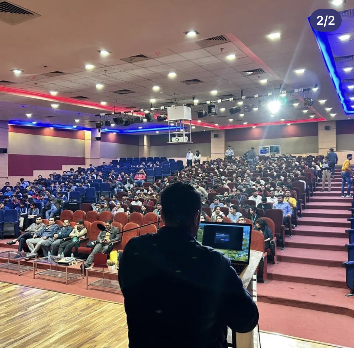 Bittoo addressing a packed hall of students
